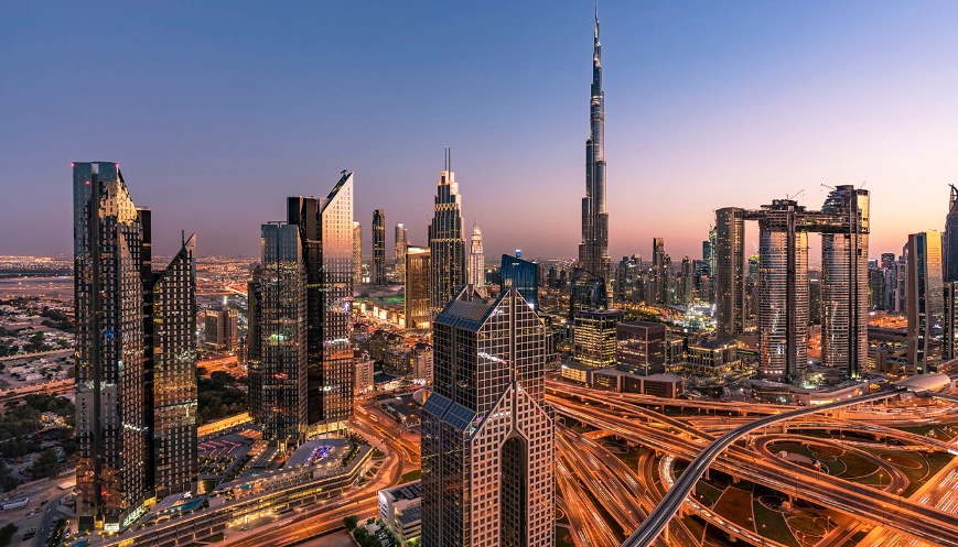 Dubai sky line with traffic junction and Burj Khalifa.
