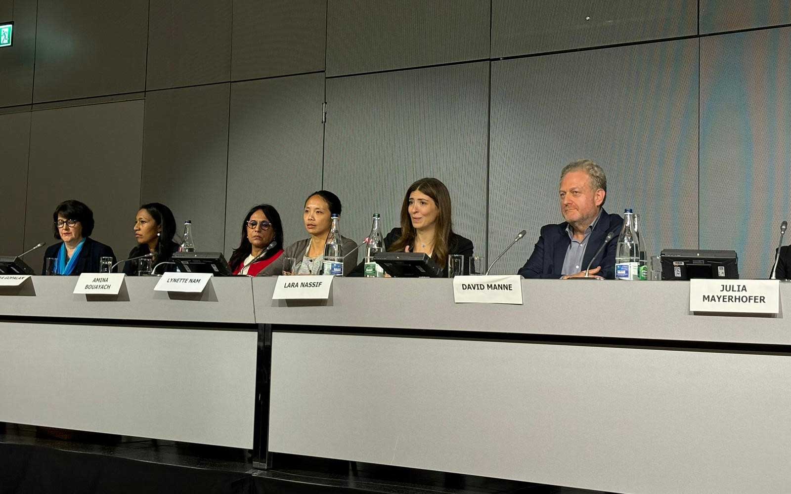 Pro Bono Counsel, Lara Nassif (second from right) speaking at the launch event